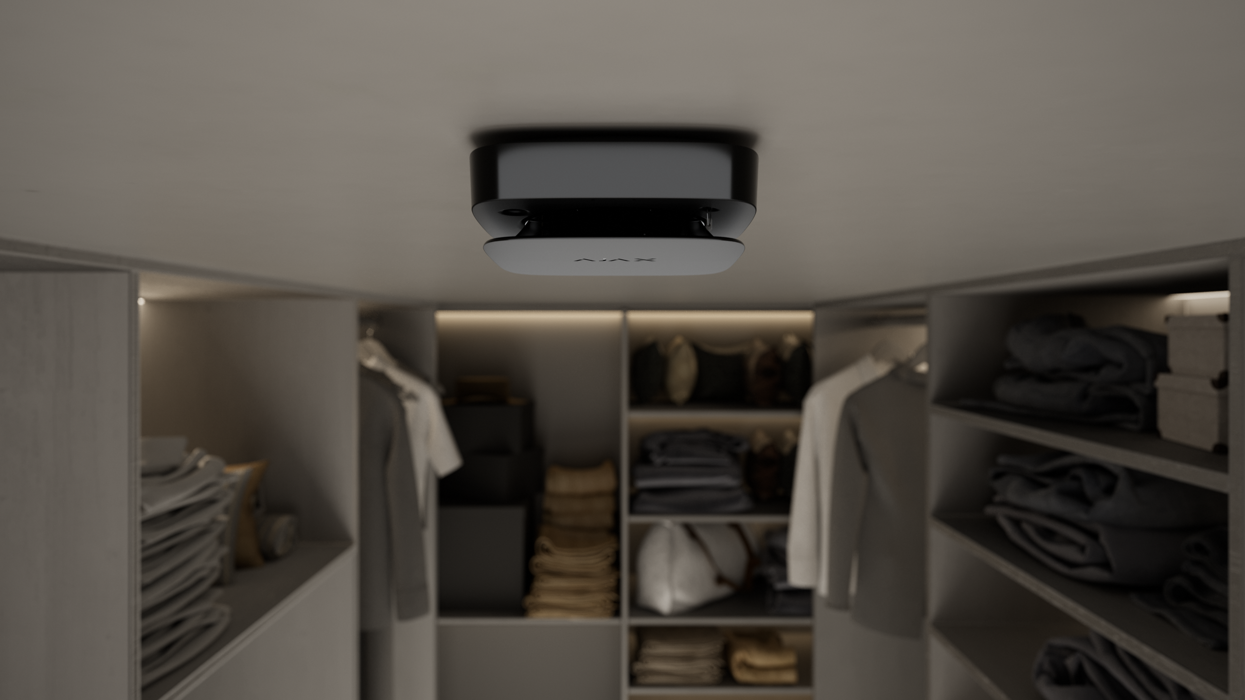 Lifestyle-Ajax-FireProtect-2-RB-Heat_Smoke_CO-Jeweller-black-wardrobe.png